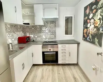 Una cocina o zona de cocina en 2 Bedrooms Flat 50 mts away from Las Canteras beach