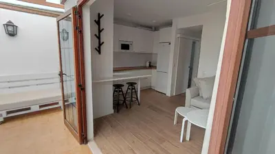 Una televisión o centro de entretenimiento en Excelente Bungalow en Maspalomas