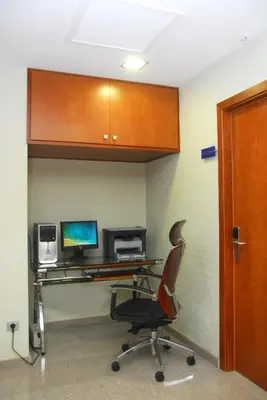 Una televisión o centro de entretenimiento en Hotel Pujol
