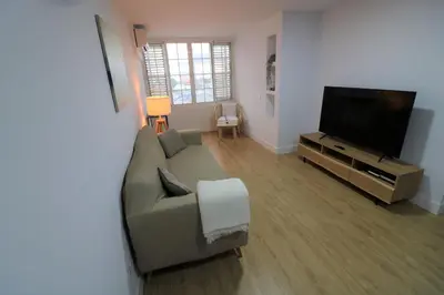 Una televisión o centro de entretenimiento en Lovelly renovated apartment