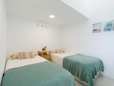Cama o camas de una habitación en Aquarium Bungalow private jacuzzi, 3 bedrooms, AC and Bikes