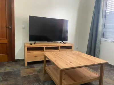 Una televisión o centro de entretenimiento en Viv.Vacacion. Lucía: Apartamento céntrico Ingenio.