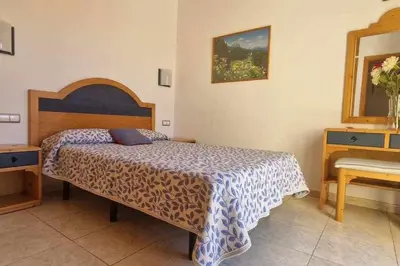 Cama o camas de una habitación en Marlenghi Apartments Sonemar