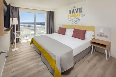 Cama o camas de una habitación en Abora Interclub Atlantic by Lopesan Hotels