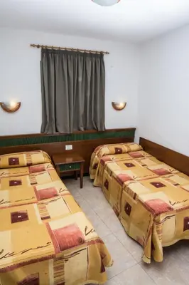 Cama o camas de una habitación en Las Faluas
