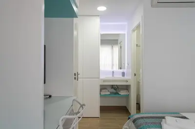 Cama o camas de una habitación en Petit Accommodation Las Canteras Premier