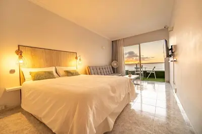 Cama o camas de una habitación en El 5º Cielo