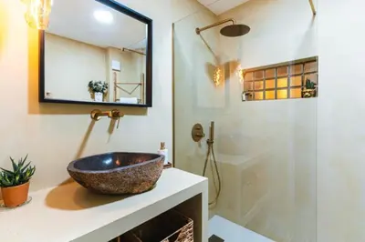 Un baño de Coral Canteras Loft by Gestión Vacacional Canarias