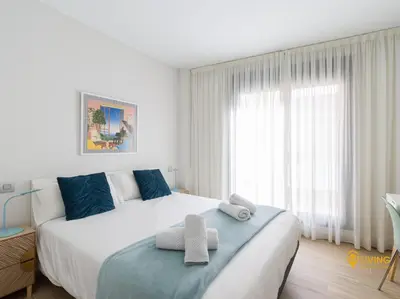 Cama o camas de una habitación en Living Las Canteras Homes - UNIQUE PENTHOUSE