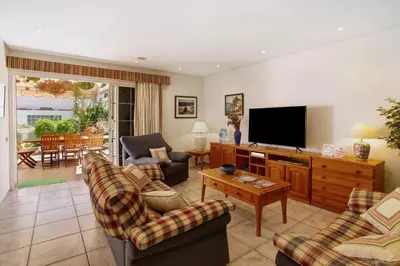 Una televisión o centro de entretenimiento en VCV BUNGALOW BELDA