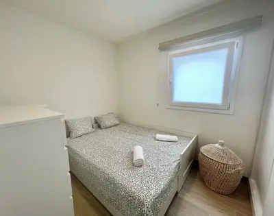Cama o camas de una habitación en Blue Sky City Apartment