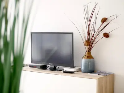 Una televisión o centro de entretenimiento en Moon Dunes Apartment - by Yumbo Center - Playa del Ingles