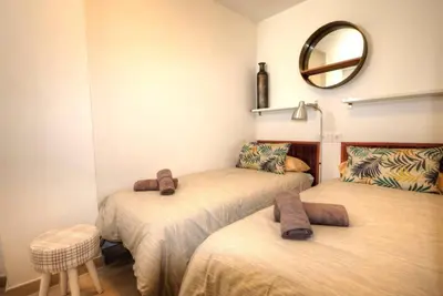 Cama o camas de una habitación en CÉNTRICO APARTAMENTO 737 by CASAS COCODRILO
