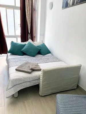 Cama o camas de una habitación en Estudio Esperanza