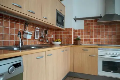 Una cocina o zona de cocina en Casa Notas de Color Y Sal