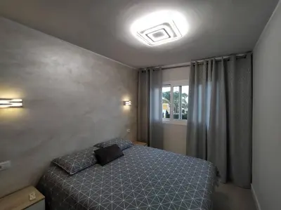 Cama o camas de una habitación en Holiday Apartment Alegranza