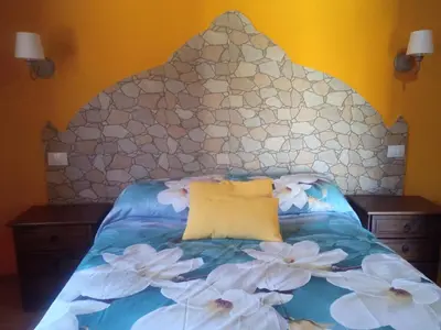 Cama o camas de una habitación en Casona Eladio