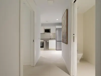 Una cocina o zona de cocina en Royal Suites-Viviendas Vacacionales