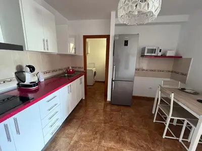 Una cocina o zona de cocina en Melo Home Vecindario-Near AirPort-Elevator-Garage