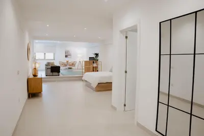 Cama o camas de una habitación en Las Canteras Beach Suites