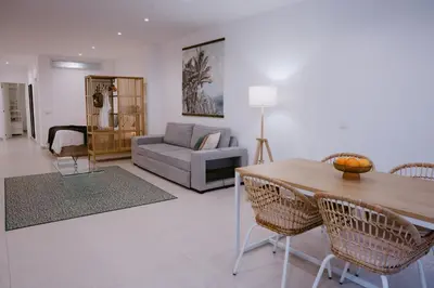Zona de estar de Las Canteras Beach Suites