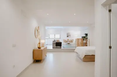 Cama o camas de una habitación en Las Canteras Beach Suites
