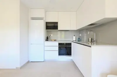 Una cocina o zona de cocina en Brand New 2BR with Auto Check-In