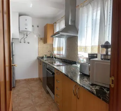 Una cocina o zona de cocina en Viviendas Vacacionales en el centro de Valleseco By Artenatur